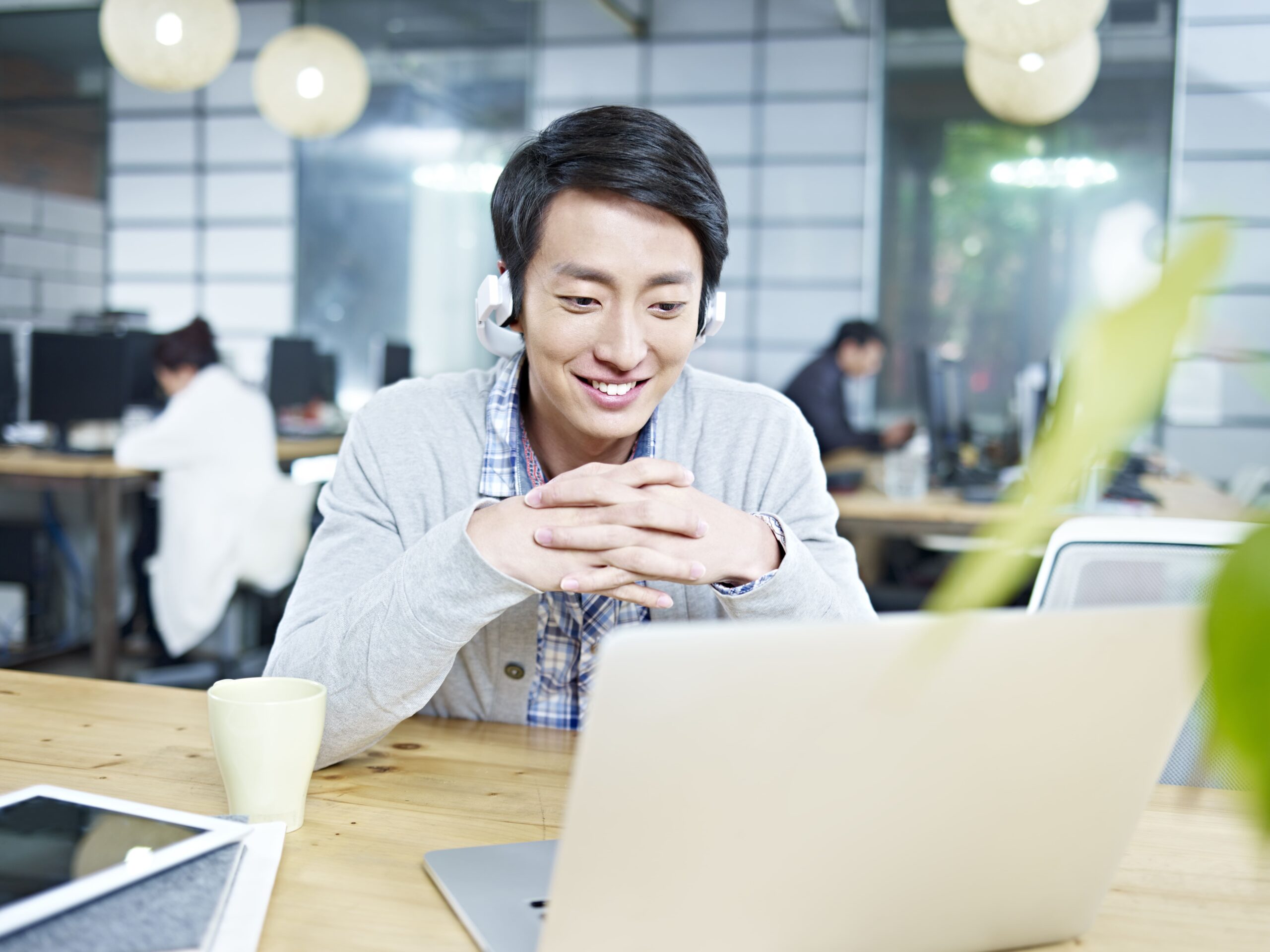 Woman talking to someone on the laptop for IT support